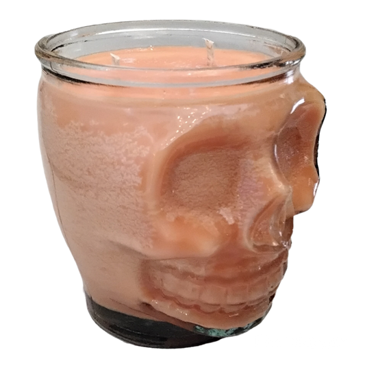white backdrop orange skull candle