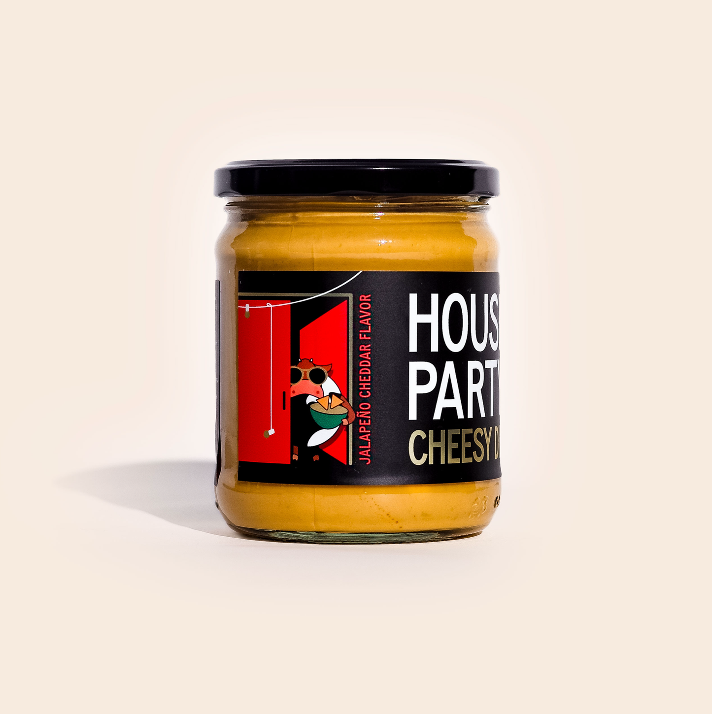 jar of house party cheesy dip orange sauce with black label on white background