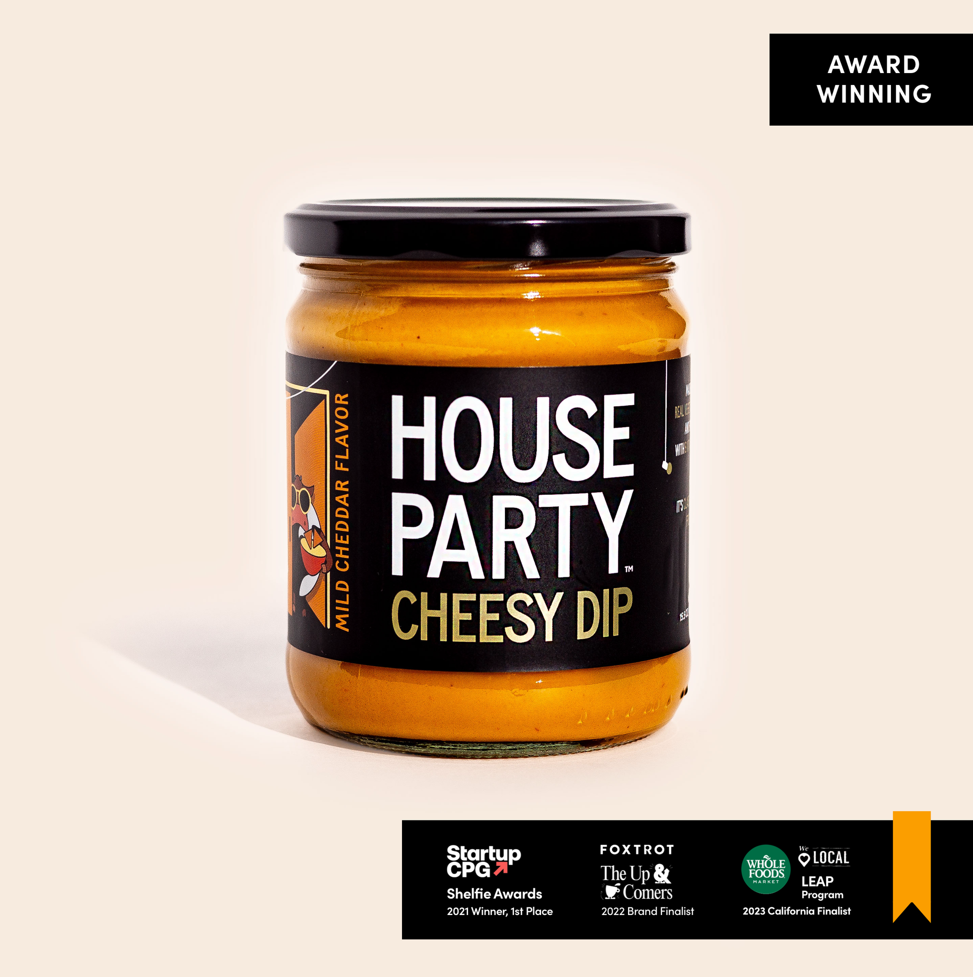 jar of house party cheesy dip orange sauce with black label on white background