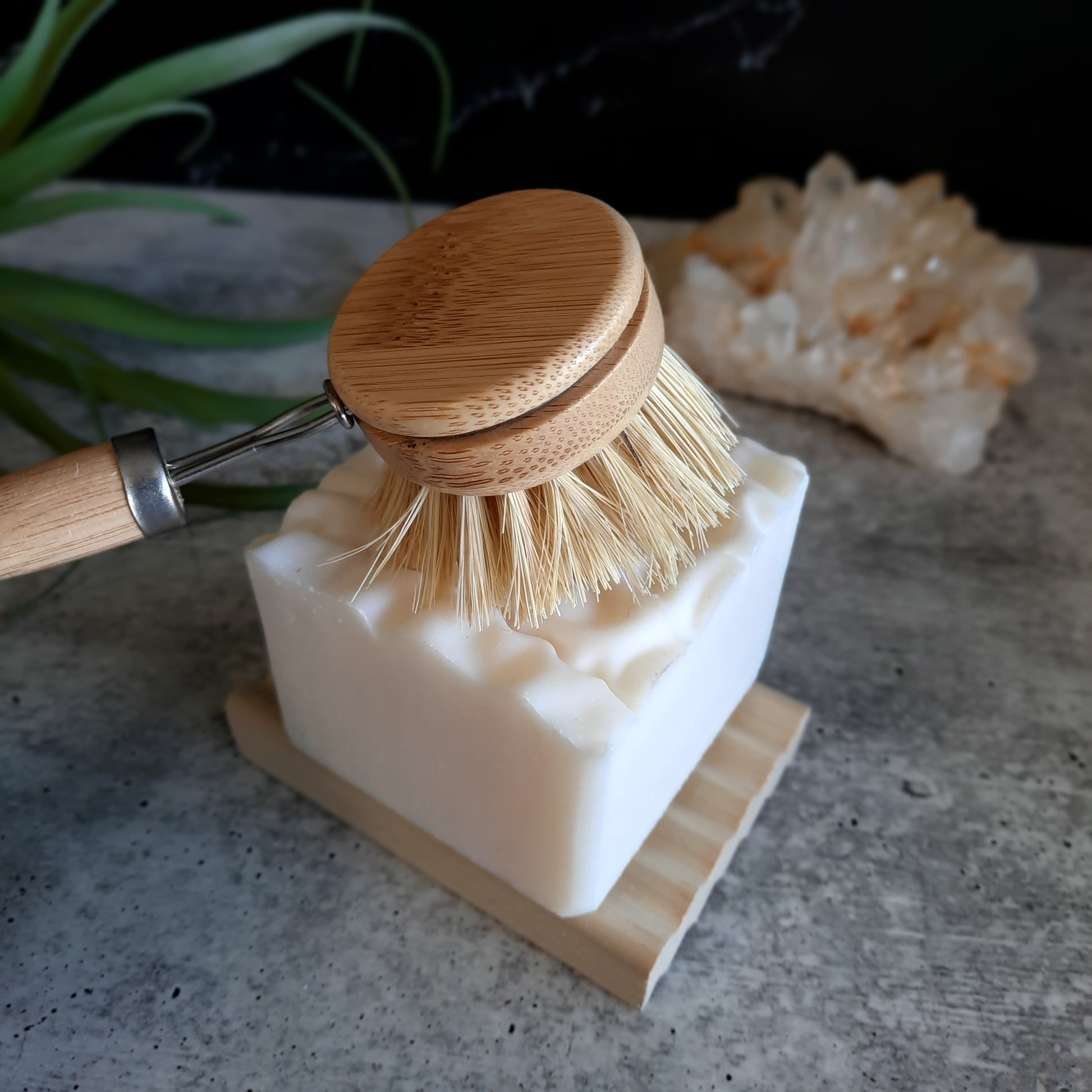 block of white dish soap with bamboo bursh head