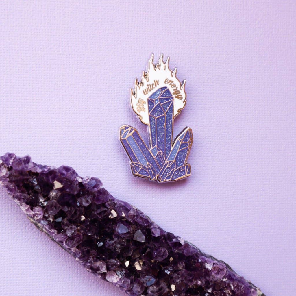 purple background amethyst stone cluster and pin